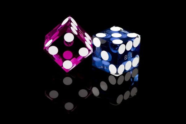 qqindah live dealer studio with professional dealer, multiple camera feeds, and real cards