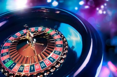 Live dealer studio with Crazy Time wheel display on monitor